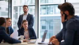 trainer looking at person during a mock session