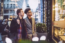 Two men window shopping