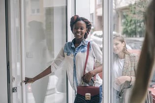 Customers entering retail store