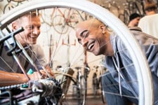 customer laughing in bike store