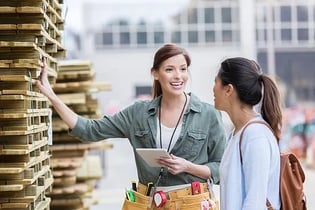 Saleswoman talking to customer