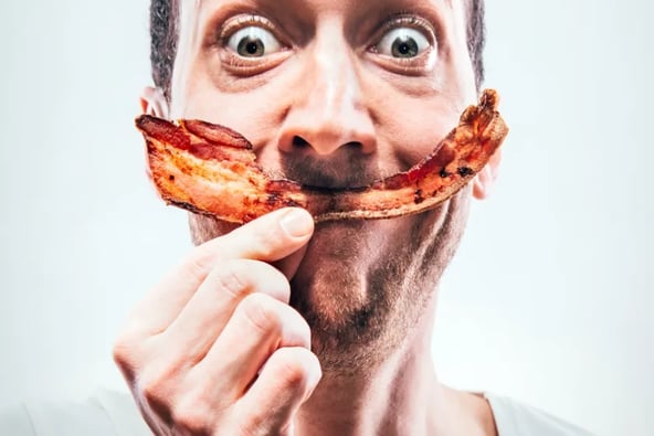 Man holding bacon